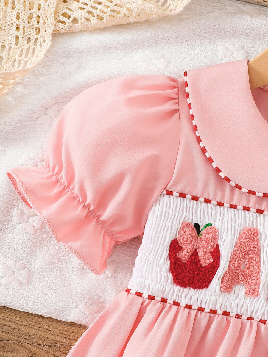 Pink A-line dress with knee-length and button