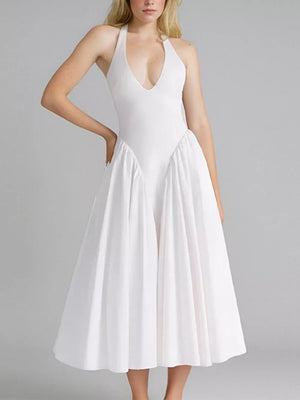 White halter neck midi dress with deep V-neck and full skirt