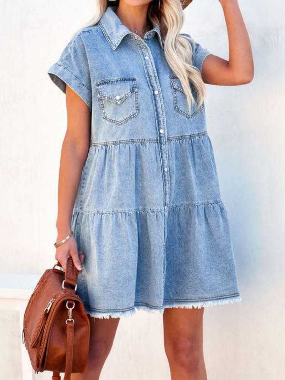 Light blue denim tiered shirt dress with frayed hem and short sleeves
