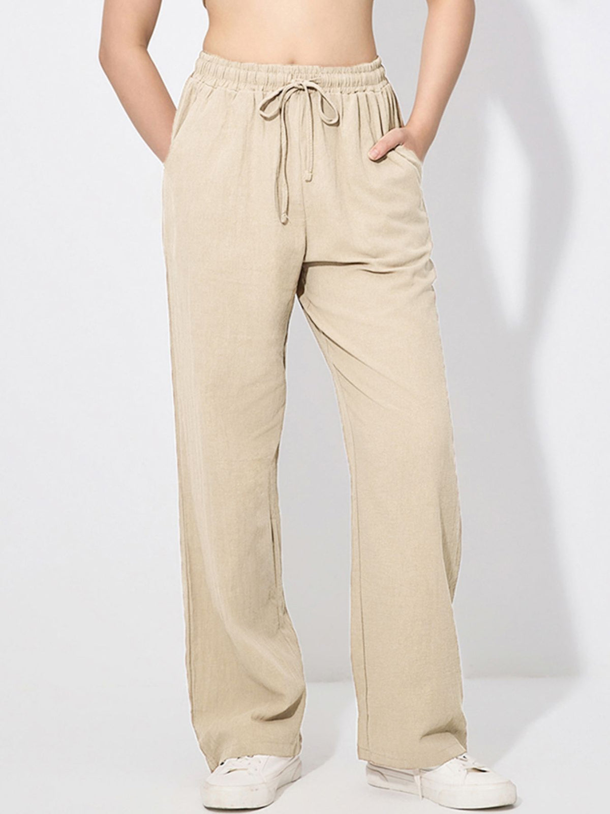 Drawstring wide leg casual pants in apricot with pockets and a tie waist.
