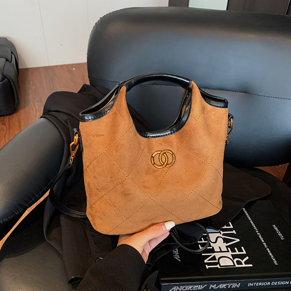 Brown quilted suede shopper bag with diamond pattern and gold logo detail