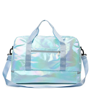 Iridescent duffel bag in Pastel Blue with separate compartment and adjustable strap.
