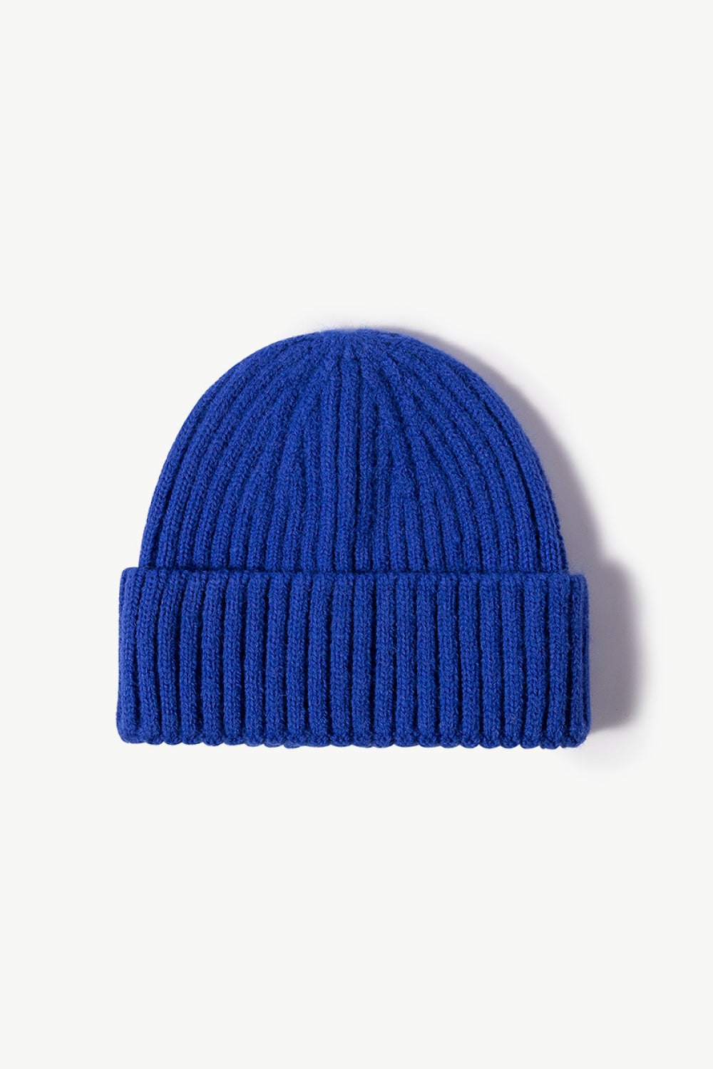 Blue chunky ribbed knit beanie made of acrylic.