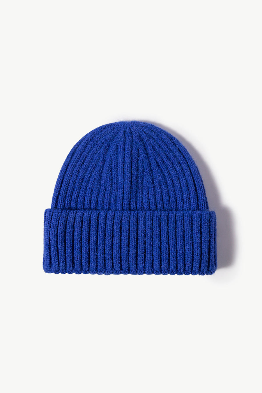 Blue chunky ribbed knit beanie made of acrylic.