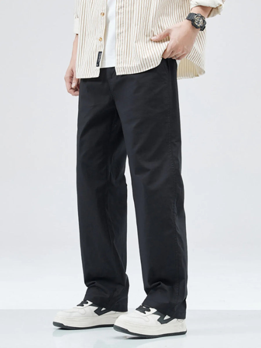 Black casual loose fit straight leg trousers with a relaxed cut.