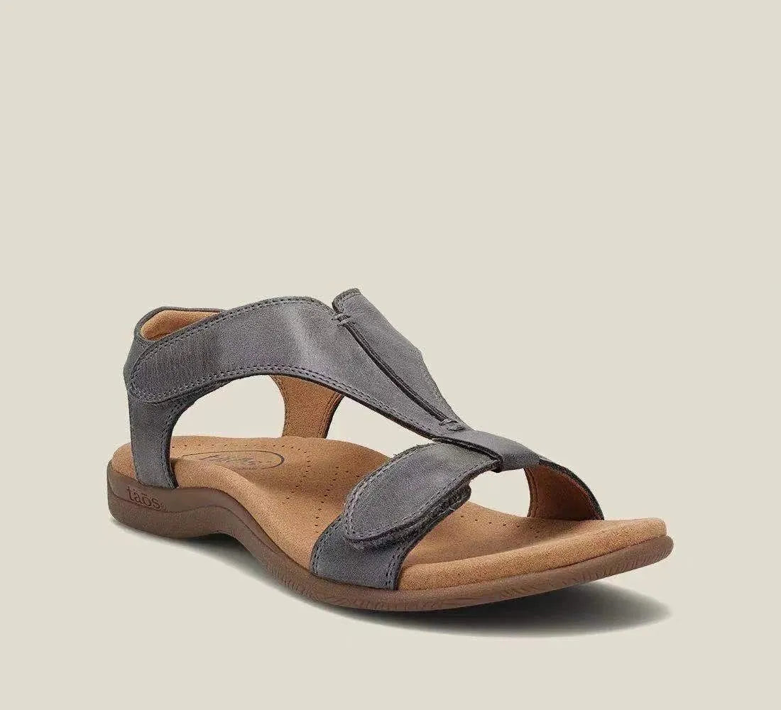 Gray leather T-strap comfort sandals with adjustable hook-and-loop straps.
