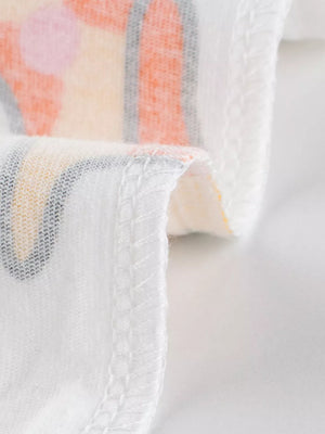 White cotton t-shirt with colorful stripe and dot pattern, crew neck, short sleeves