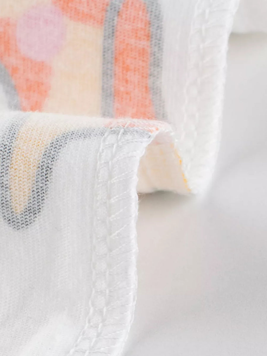 White cotton t-shirt with colorful stripe and dot pattern, crew neck, short sleeves