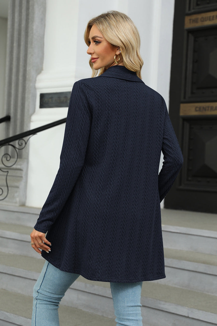 Dark Navy cable knit cardigan with a drape front and long sleeves.