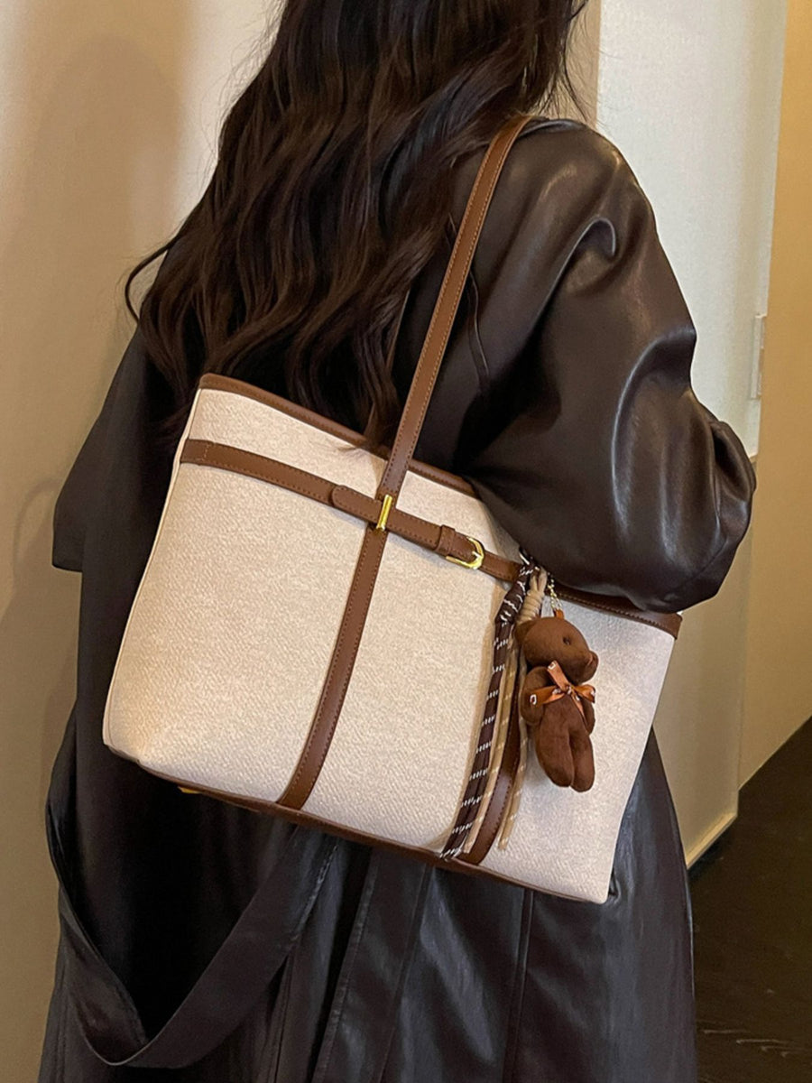 tote in Off-white with geometric and decorative buckle