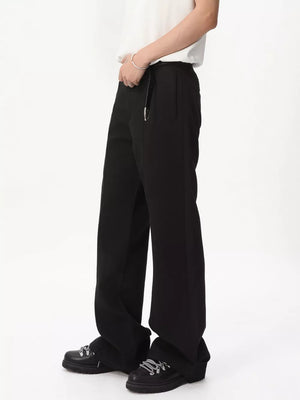 Black wide-leg sweatpants with adjustable waist and side pocket detail.