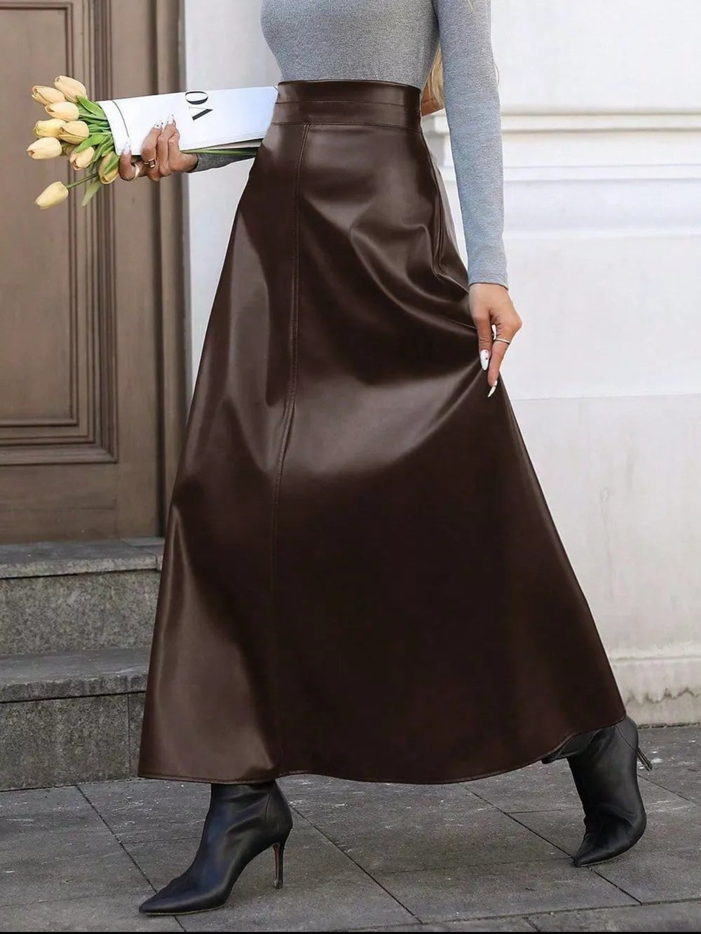 Brown leather-like A-line midi skirt with central seam detail