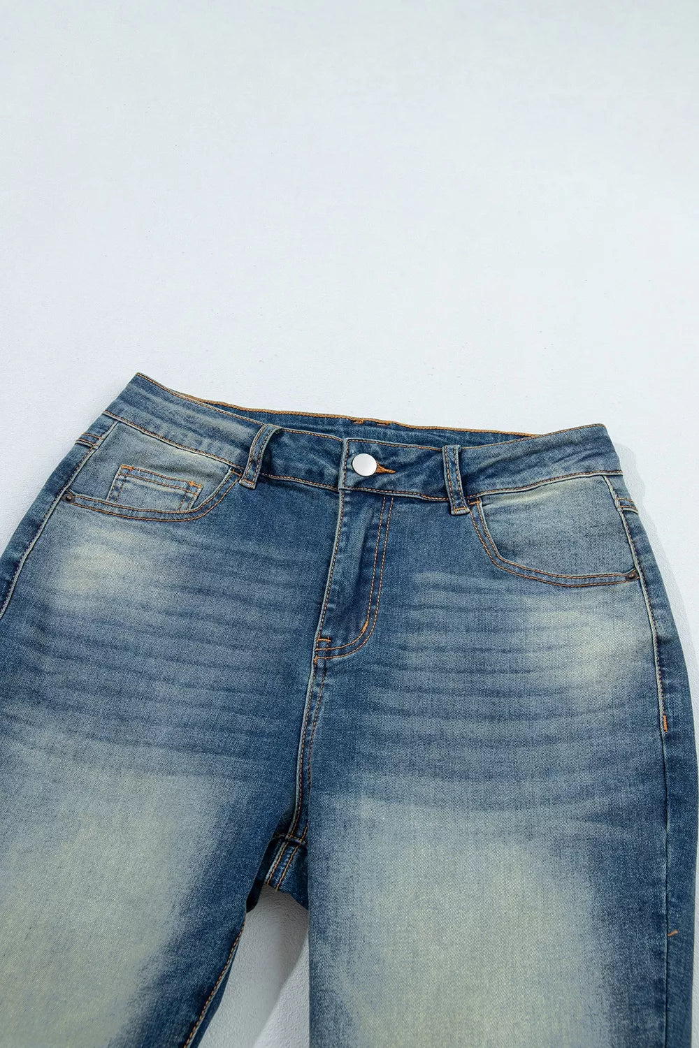 Pocket Detail Flare Leg Jeans in dark wash blue with pocketed