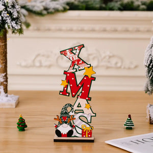 Wooden XMAS word block decoration with gnome and gift accents
