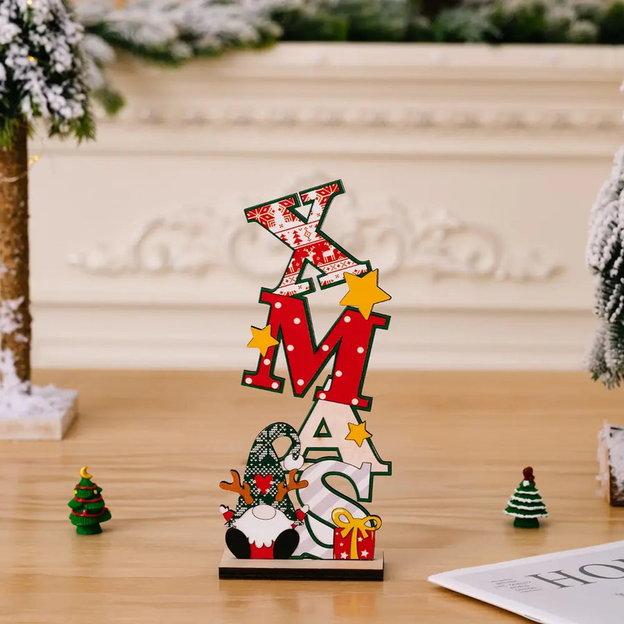 Wooden XMAS word block decoration with gnome and gift accents