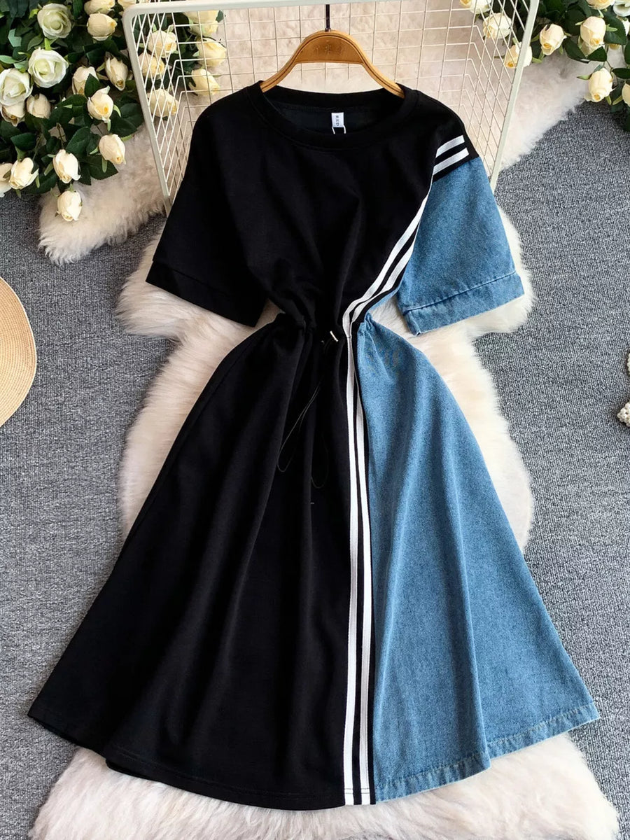 Black and denim color block casual dress with drawstring and white stripes.