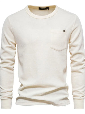 Ivory textured thermal long sleeve tee with chest pocket and minimalist detail.
