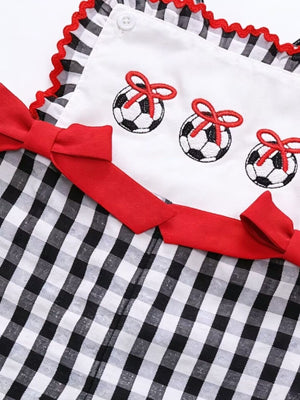 Gingham soccer ball embroidered jumpsuit with red bows and trim.