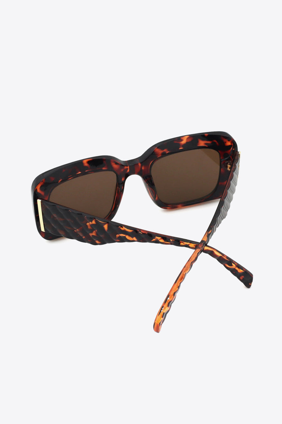 Tortoiseshell rectangular sunglasses with textured arms and brown lenses.