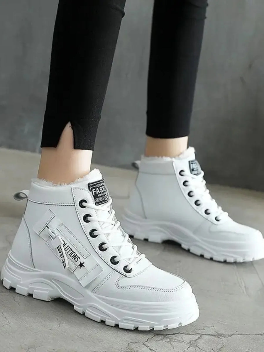White faux shearling platform boots with lace-up closure and side detail