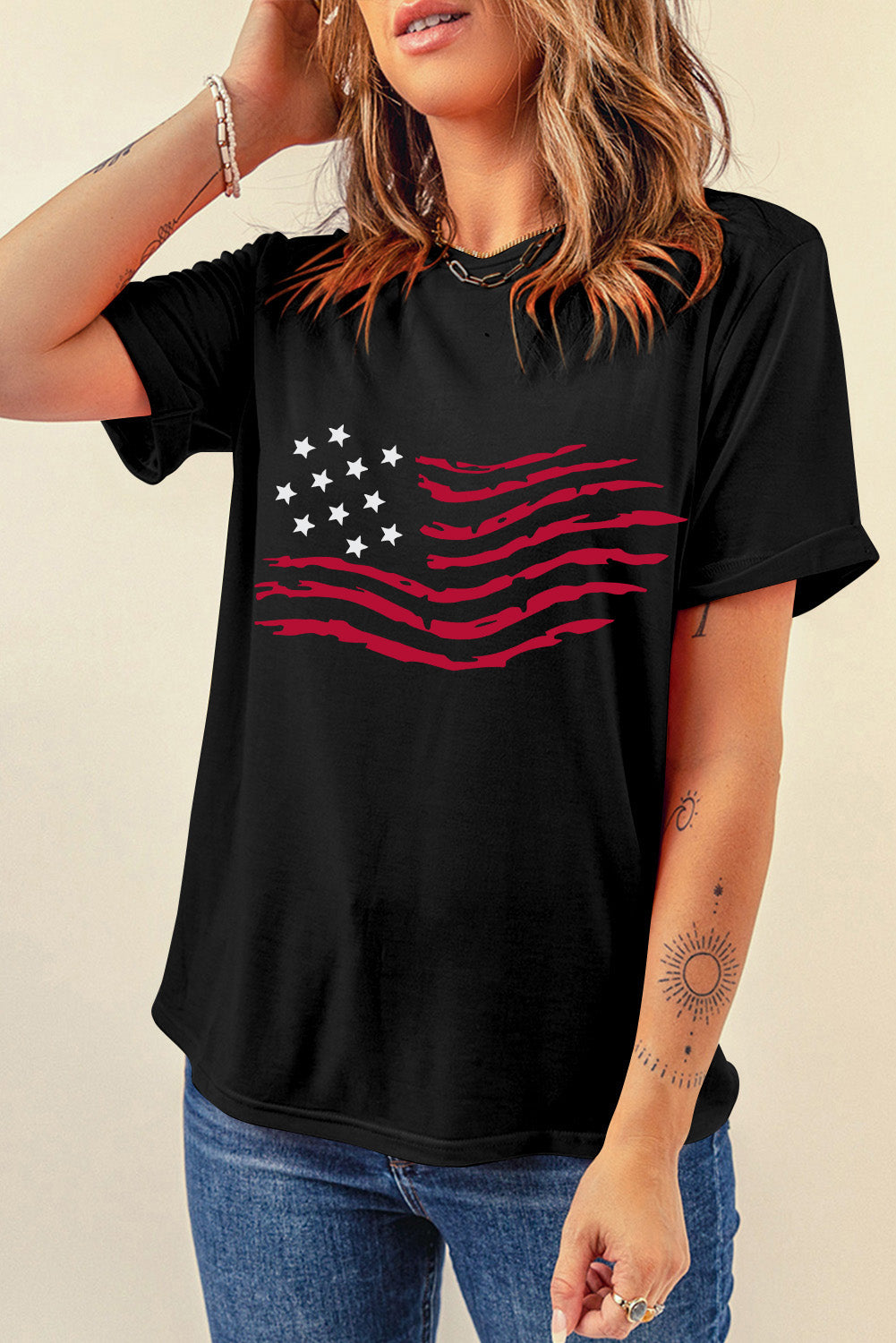 Black t-shirt with distressed American flag graphic.