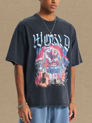 Black oversized graphic tee with distressed details and bold imagery.