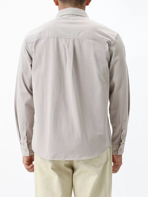 Men's light gray cotton button-down shirt with long sleeves and button cuffs.