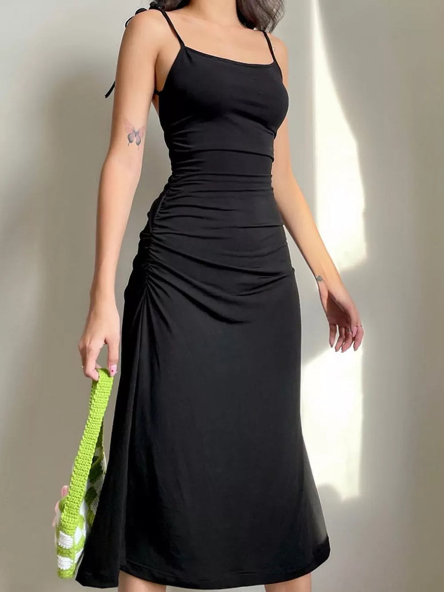 Black ruched midi dress with tie straps and bodycon fit