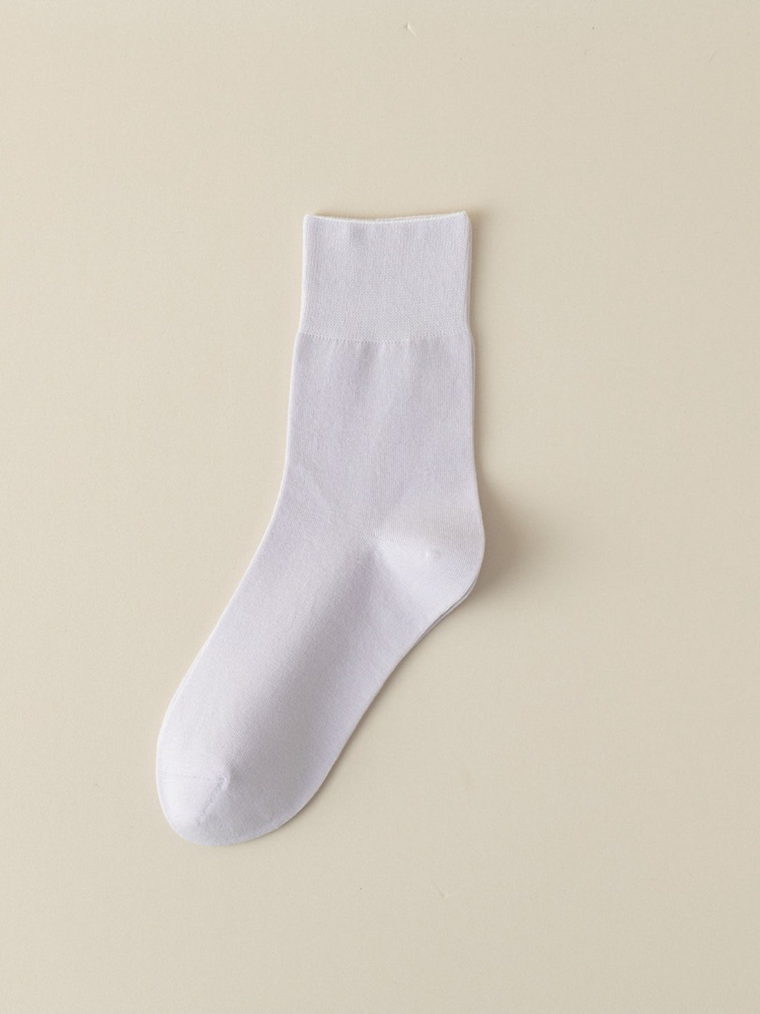 socks in Light Orange with elastic cuff and ankle-length