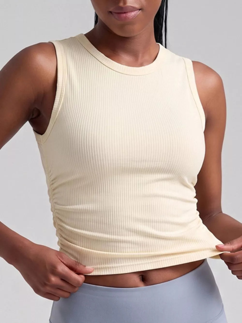 Black athletic tank featuring ribbed and ribbed