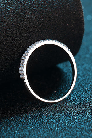 Sterling silver ring with pavé set stones, a classic band style.