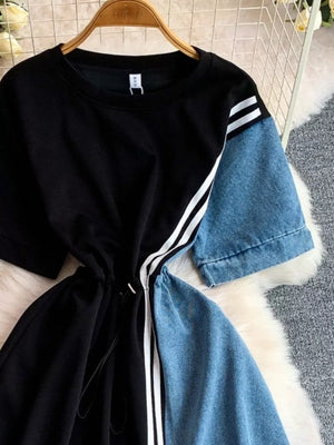 Black and denim color block casual dress with drawstring and white stripes.