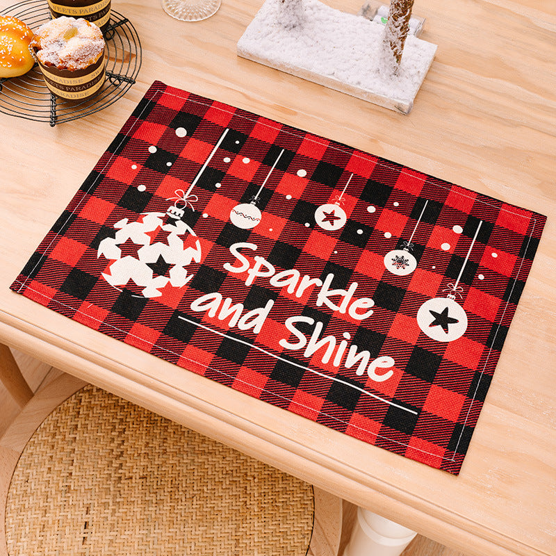 Red and black buffalo check placemat with Christmas ornaments and text