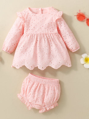 Pink embroidered lace baby top with ruffled sleeves and scalloped hem, paired with matching bloomers.