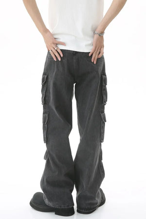 Baggy dark wash denim cargo pants with multiple pockets and pleated details.