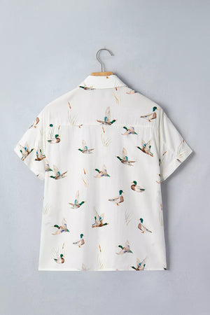 button-up shirt featuring animal-print in White with 55% cotton, 45% viscose Care instructions: Machine wash cold texture