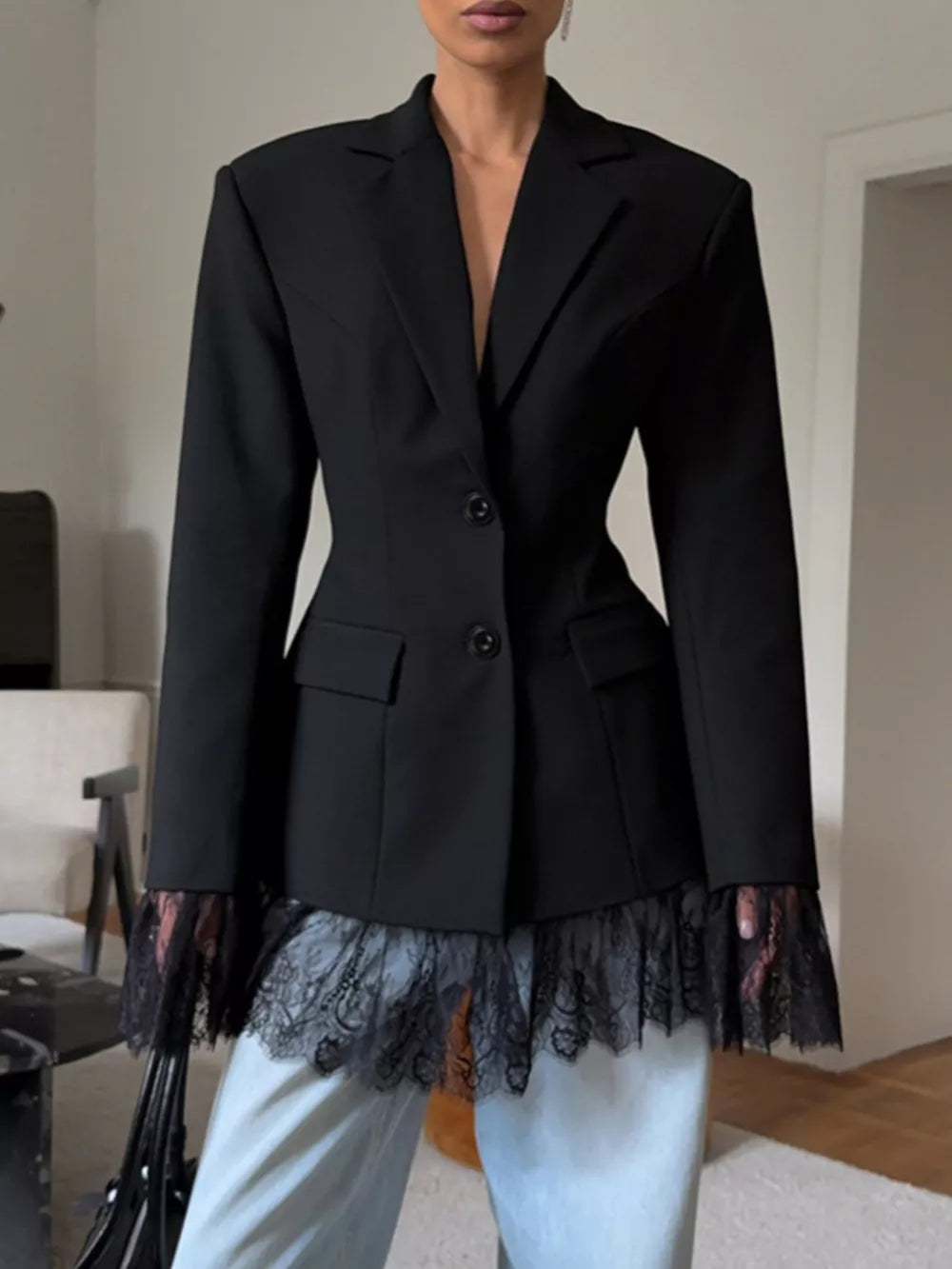 blazer in black featuring lace trim and fitted fit