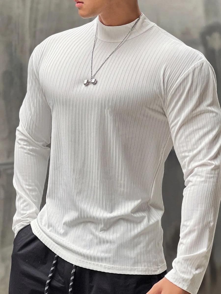 White ribbed mock neck muscle fit long sleeve top with a dumbbell pendant necklace.