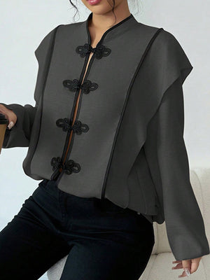 light beige blouse with mandarin collar and long sleeve