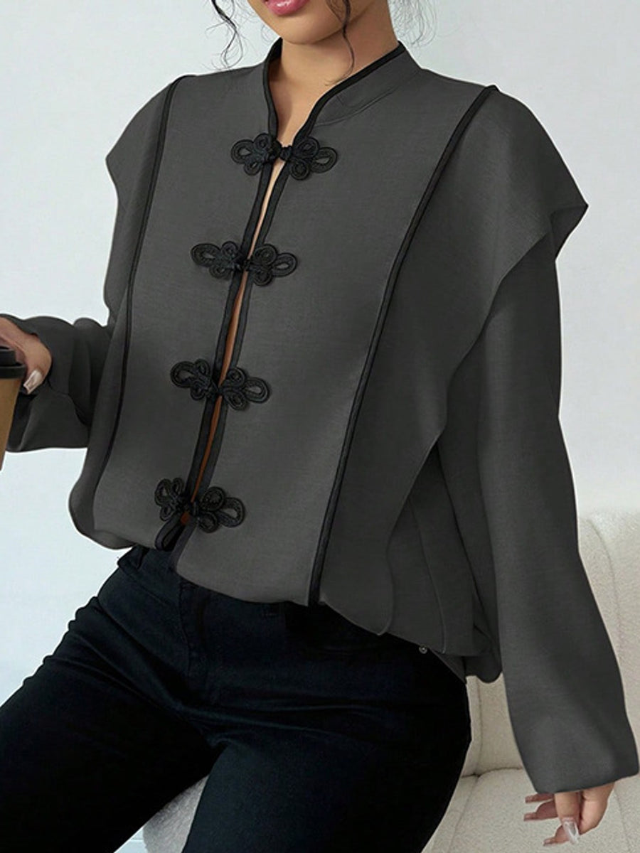light beige blouse with mandarin collar and long sleeve