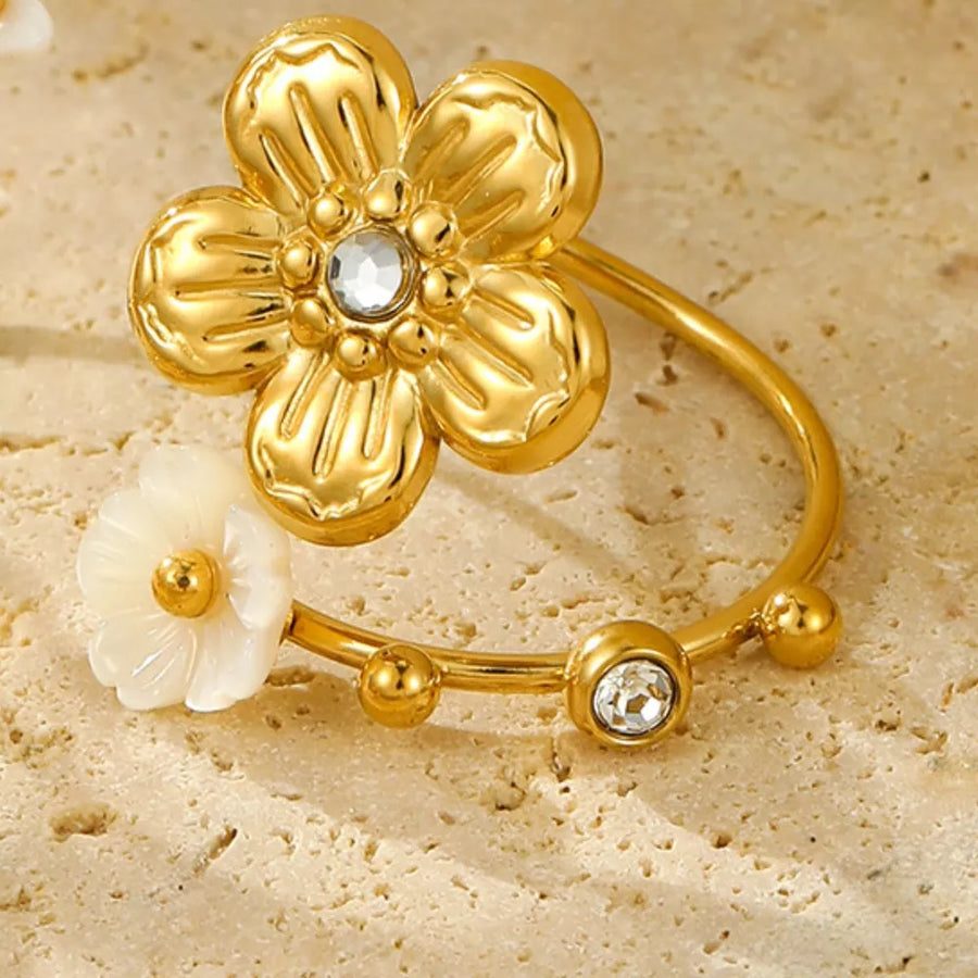Gold ring featuring adjustable and floral
