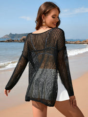 Black open-knit beach sweater with boat neck and long sleeves, acrylic.