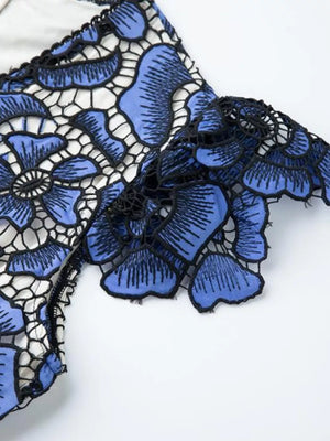 Blue floral lace midi dress with V-neck and intricate embroidery detail.