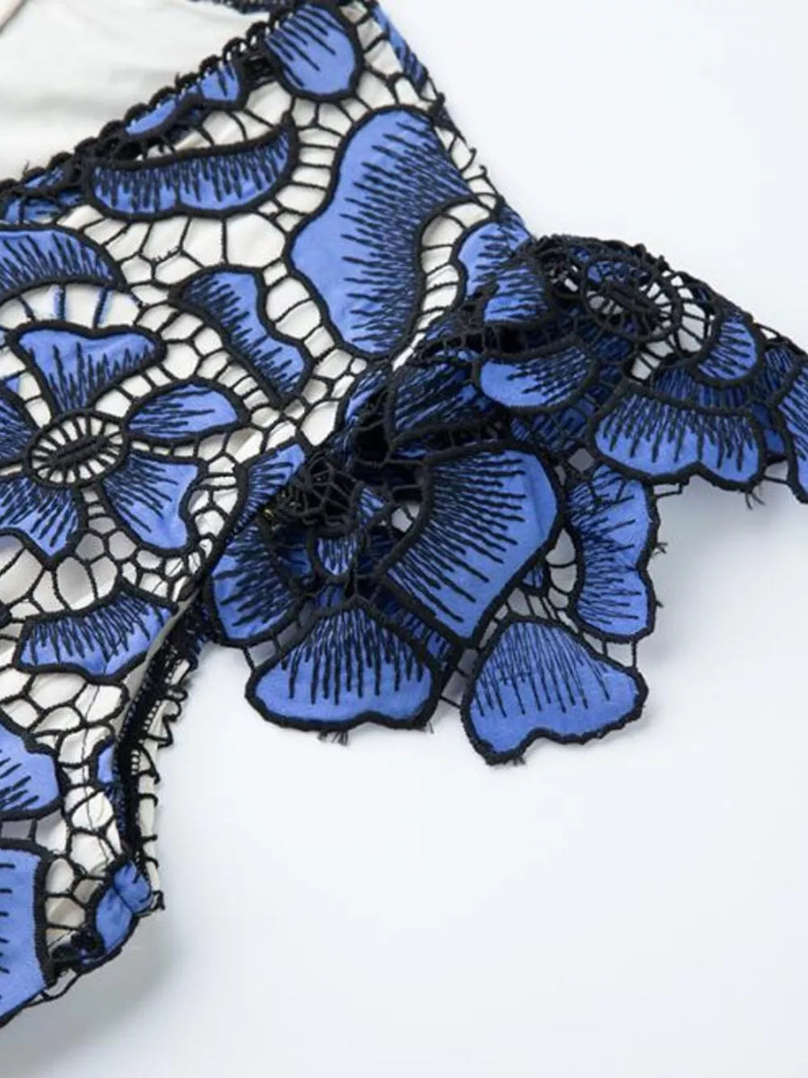Blue floral lace midi dress with V-neck and intricate embroidery detail.