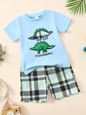 Baby boys light blue cotton tee with dinosaur print and plaid shorts.