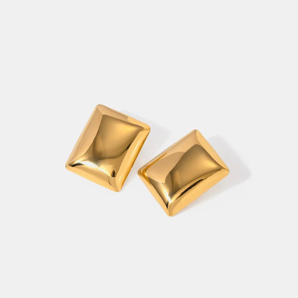 Sculpted gold rectangle earrings with a polished finish.