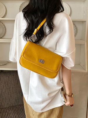 Twist Lock Flap Shoulder Bag in Yellow with flap closure
