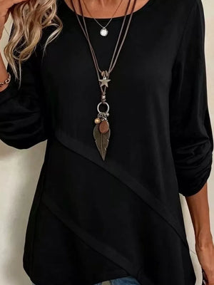 White relaxed blouse with round neck
