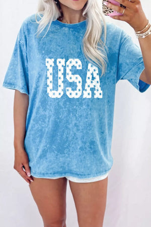 Maternity acid wash tee with USA star graphic in blue cotton.