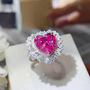 silver ring featuring heart-shaped stone and heart-shaped